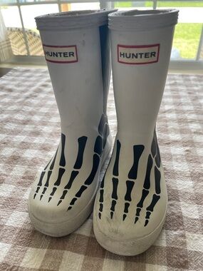Hunter Kids White Rain Boots with Black Skeleton Print
